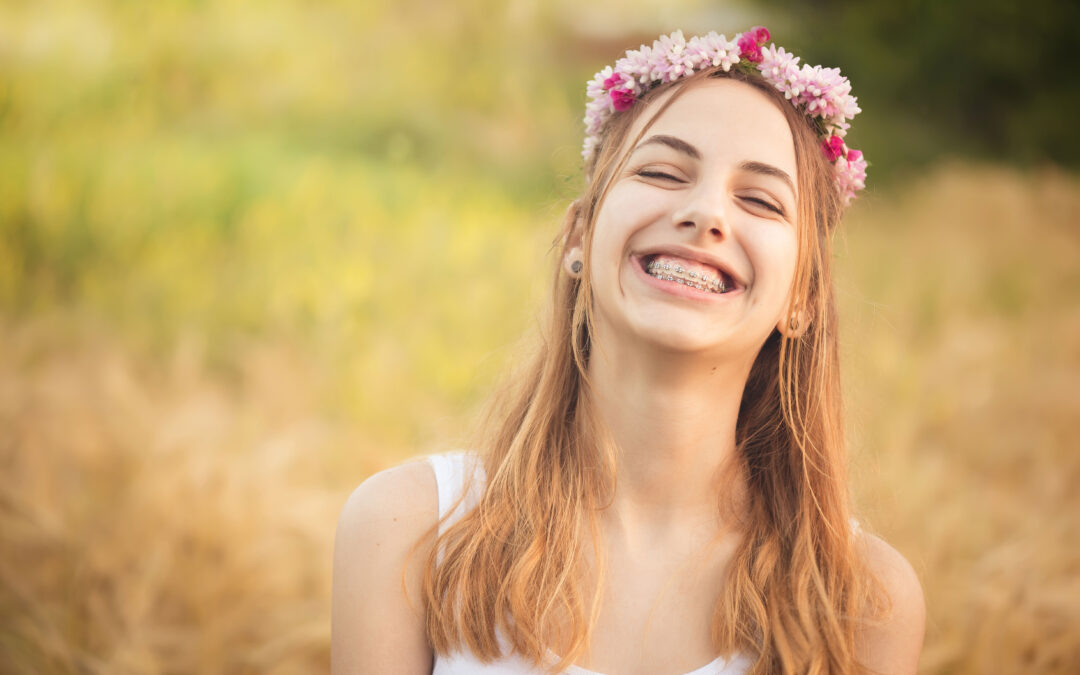 Young teen with braces in the summer